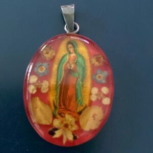 Resin encased Mother Mary sterling silver pendant made in Mexico